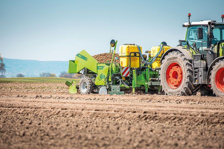 AVR planter and self-propelled harvester on farm machinery advertising website