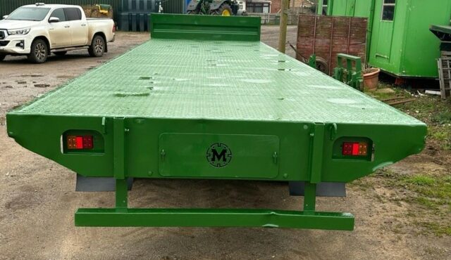 Marshall 32 foot flat trailer.