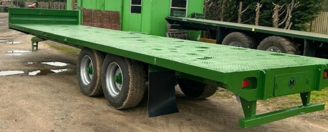 Marshall 32 foot flat trailer.