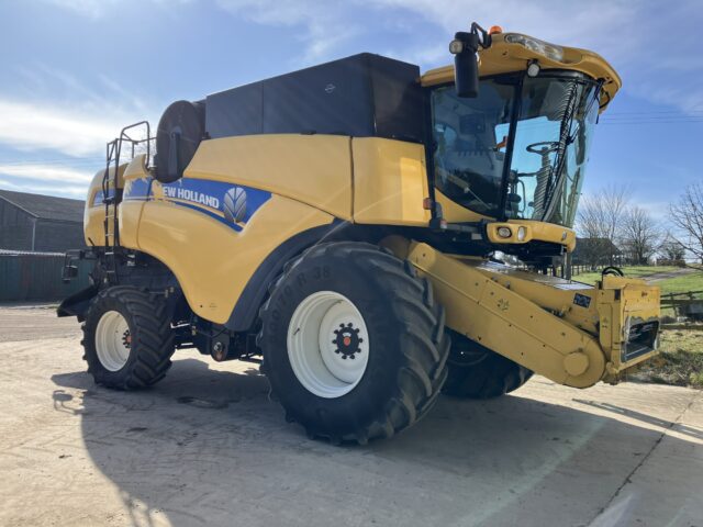 One- 2015 New Holland CX8080SL Combine