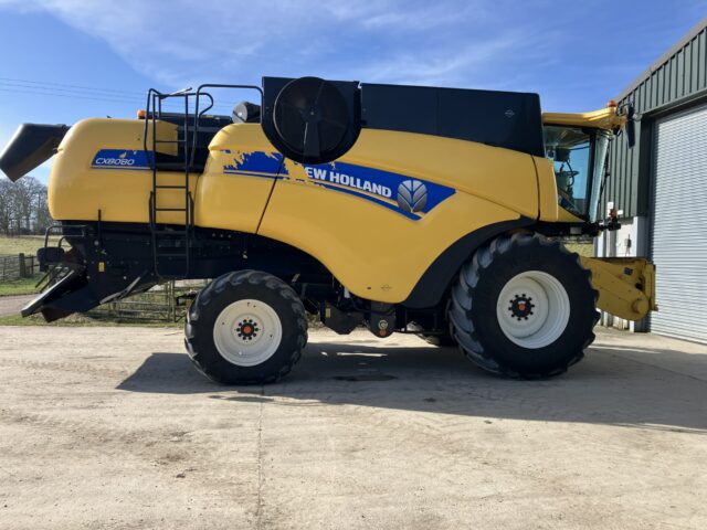 One- 2015 New Holland CX8080SL Combine