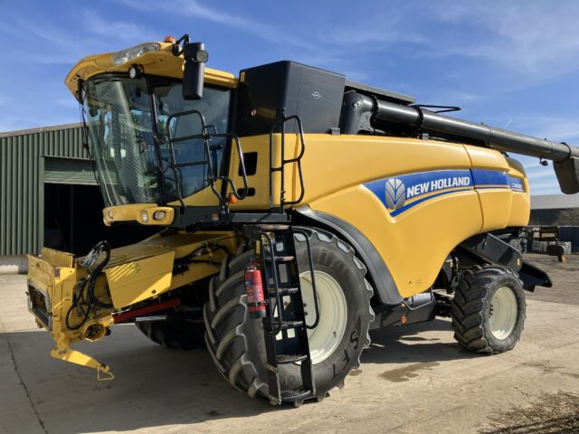 One- 2015 New Holland CX8080SL Combine