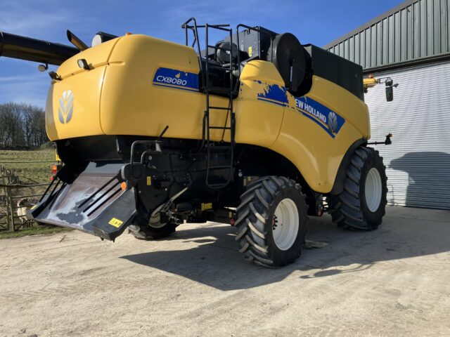 One- 2015 New Holland CX8080SL Combine